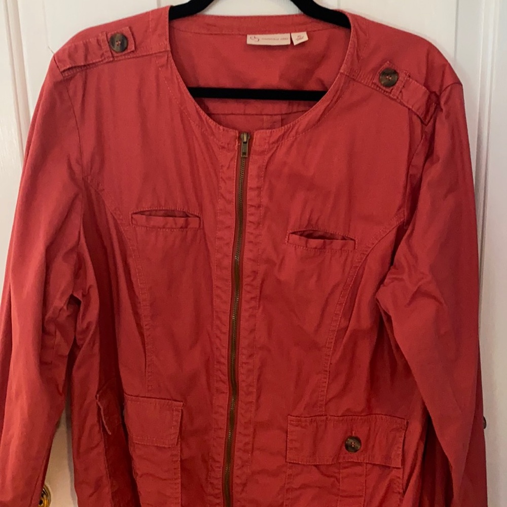 Zip up jacket.